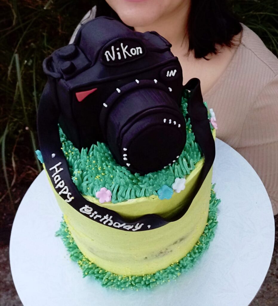 Icing Nikon DSLR Camera Figurine Anniversary Celebration Cake