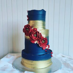 Three Tier Gold Royal Blue Wedding Cake