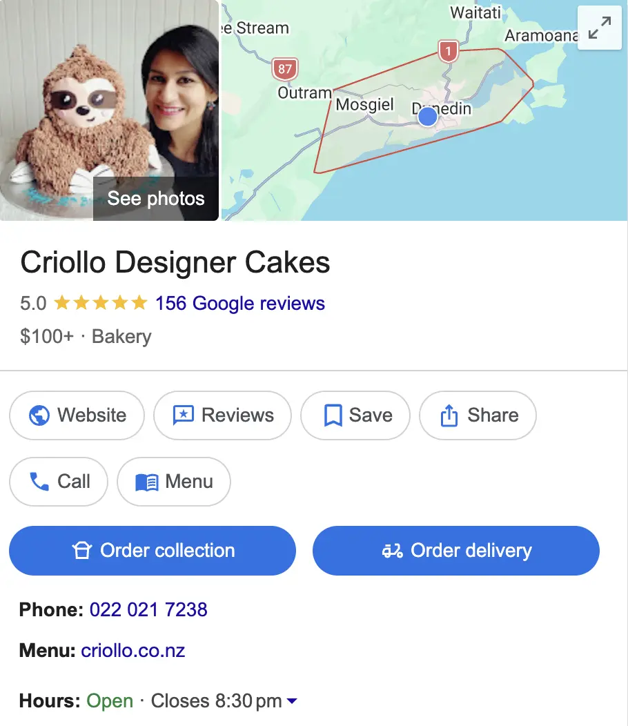 Criollo Designer Cakes Google profile showing a 5.0 rating, 156 Google reviews and a custom sloth cake in Dunedin.