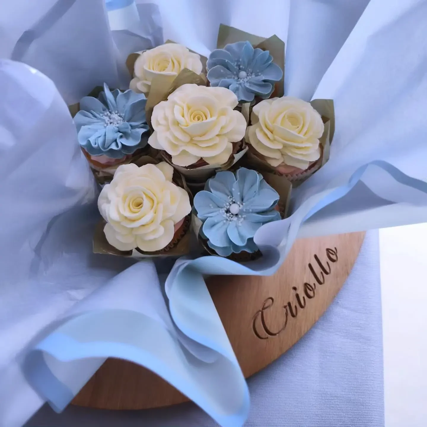 Cream and blue cupcake bouquet by The Cake Lady Dunedin in Dunedin