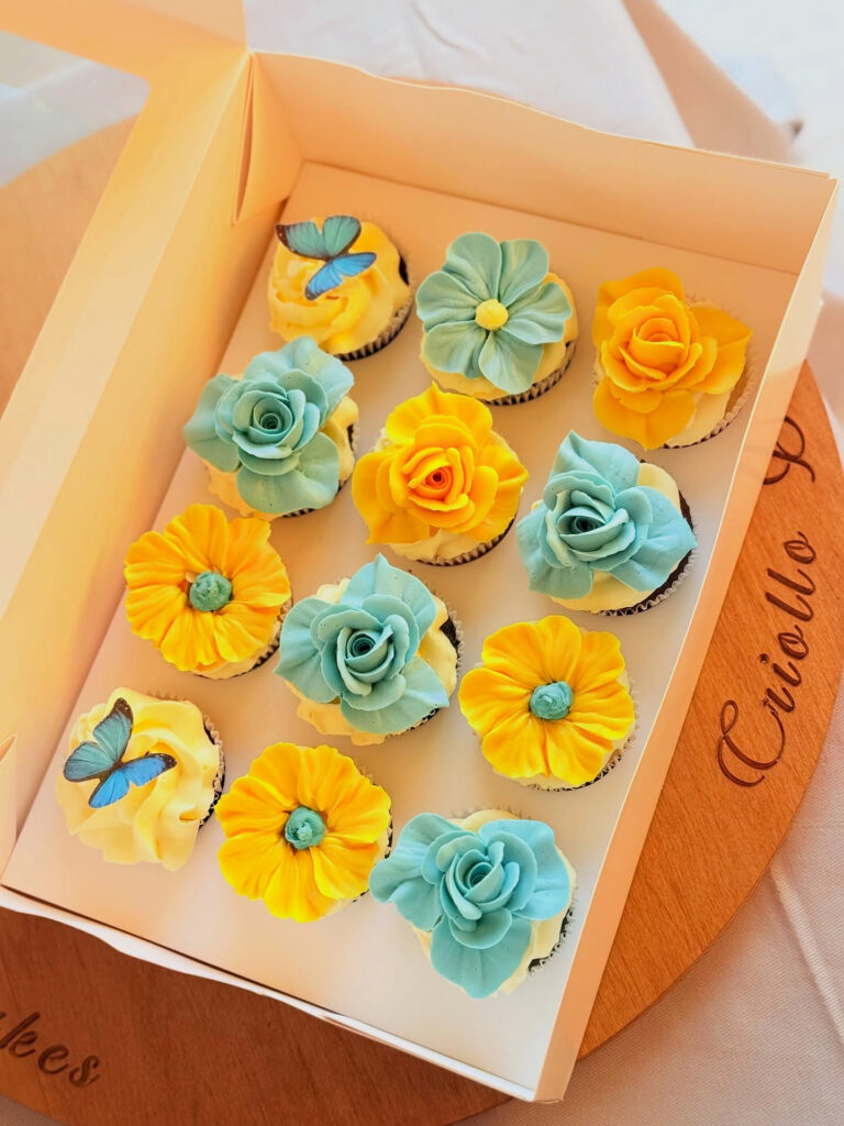 Blue and Yellow Buttercream Flower Cupcake Box by Criollo Designer Cakes in Dunedin, Otago
