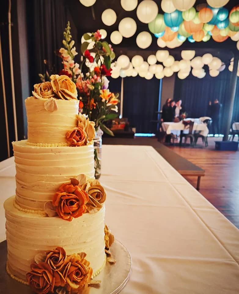 Burnt Orange Rose Ridged Wedding Cake Venue Display by Criollo Designer Cakes in Dunedin, Otago