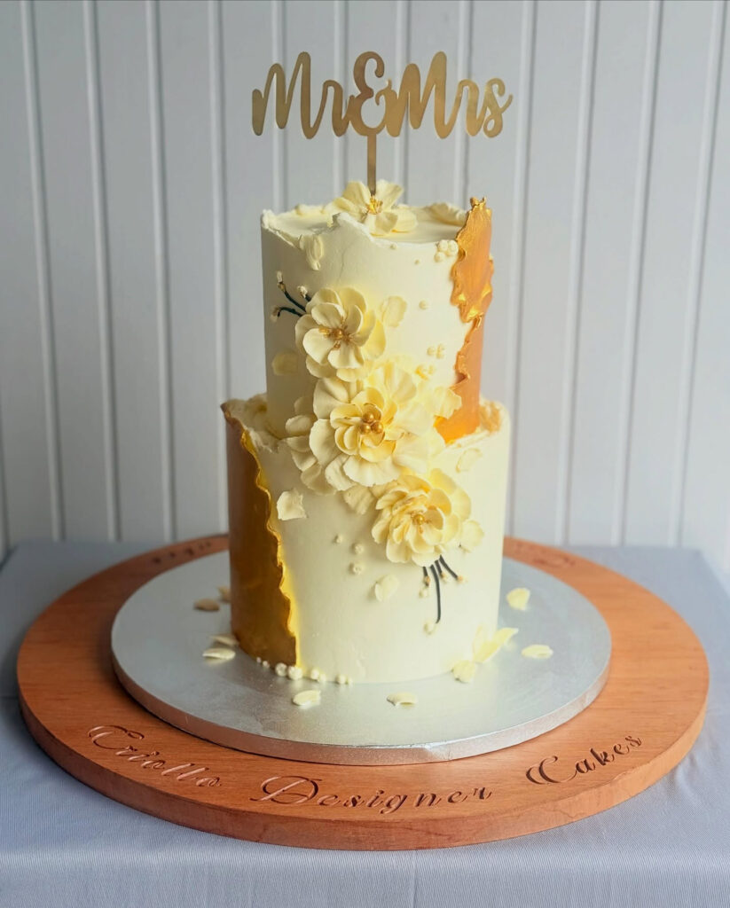 Ivory and Gold Sugar-Flower Two-Tier Wedding Cake by Criollo Designer Cakes in Dunedin, Otago