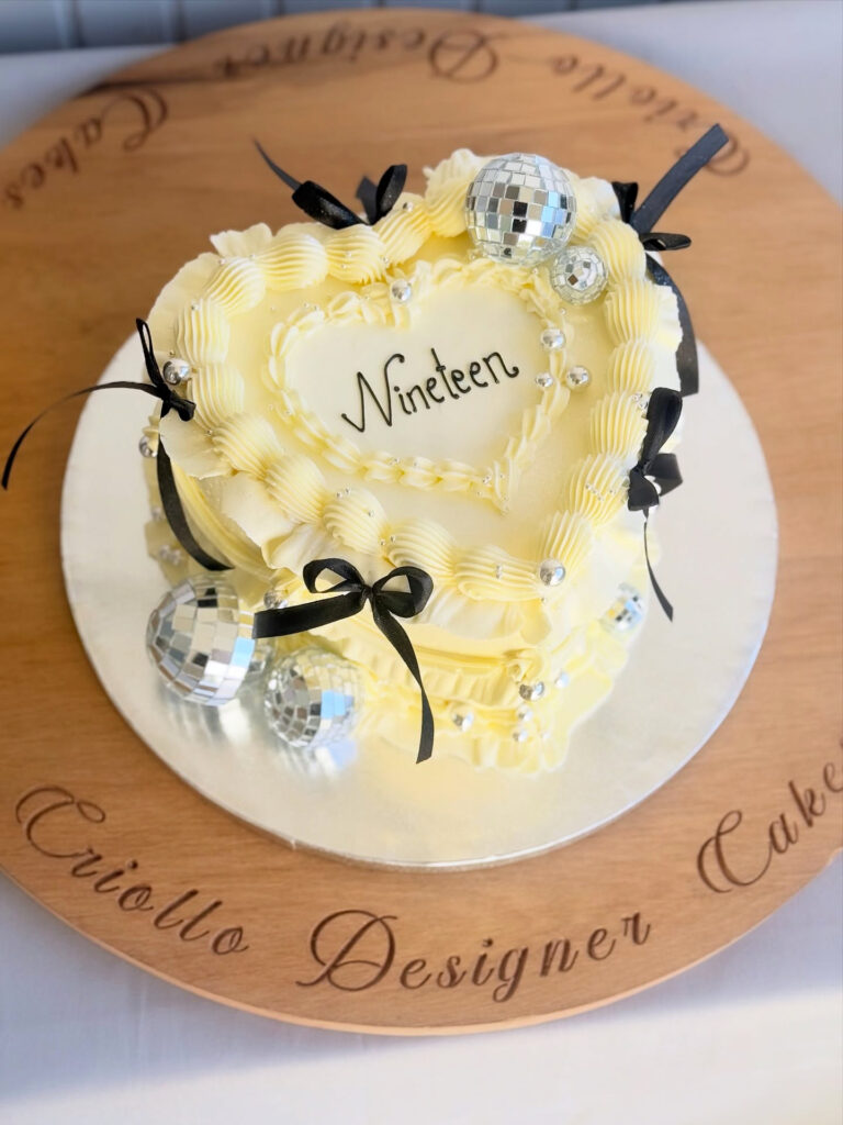 Ivory Nineteenth Birthday Cake Black Bows Disco