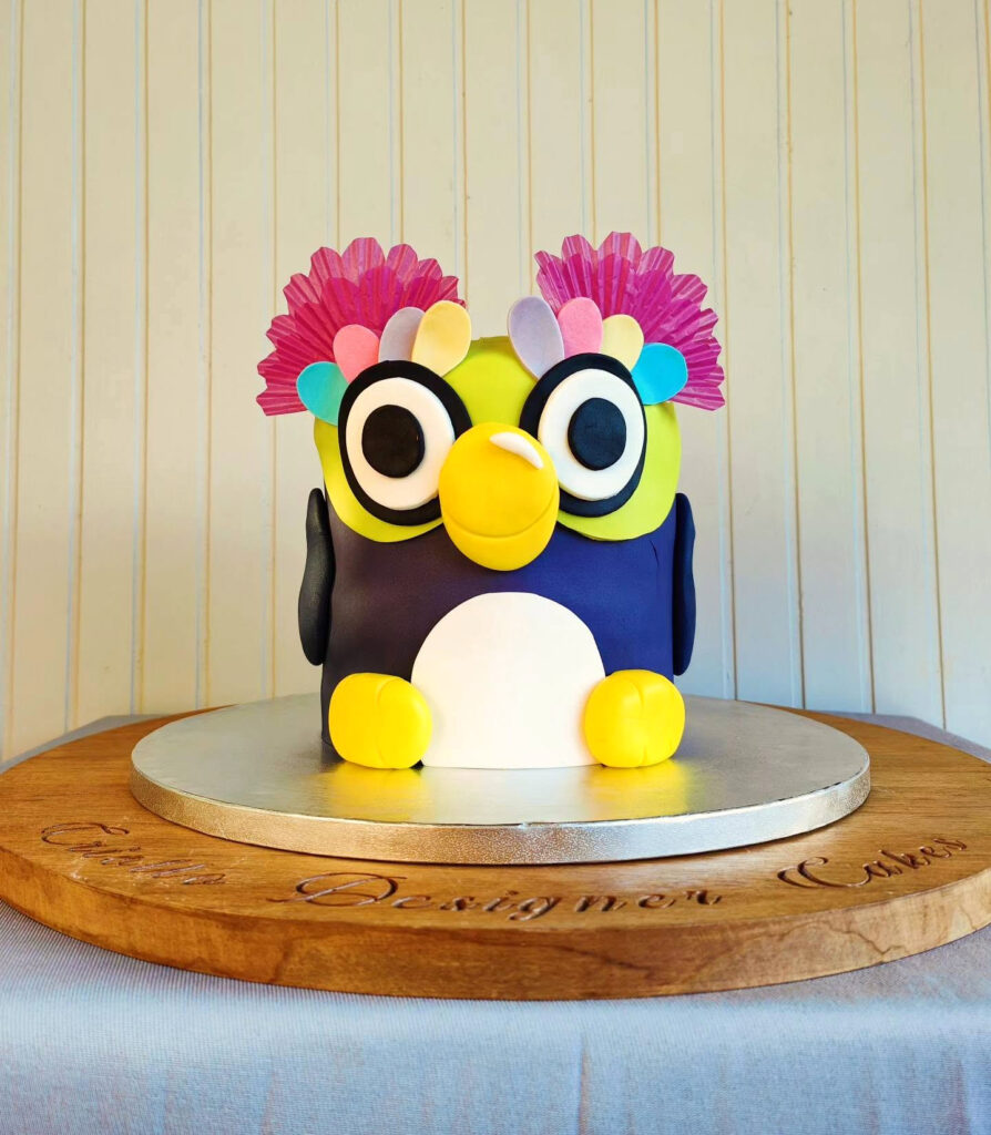 Minion Shaped Birthday Cake Yellow Purple Flowers