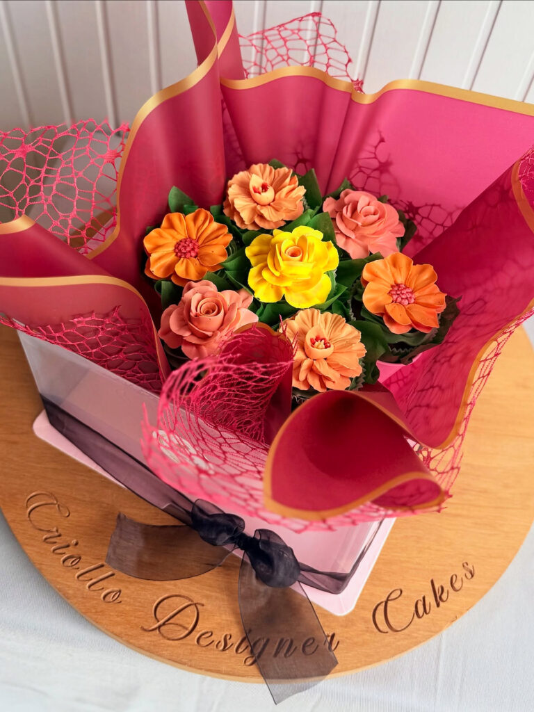Orange and Coral Flower Cupcake Bouquet by Criollo Designer Cakes in Dunedin, Otago