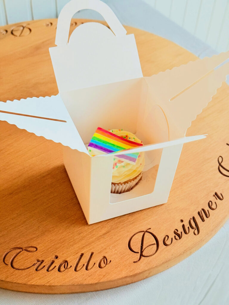 Single Rainbow Celebration Cupcake Gift by Criollo Designer Cakes in Dunedin, Otago