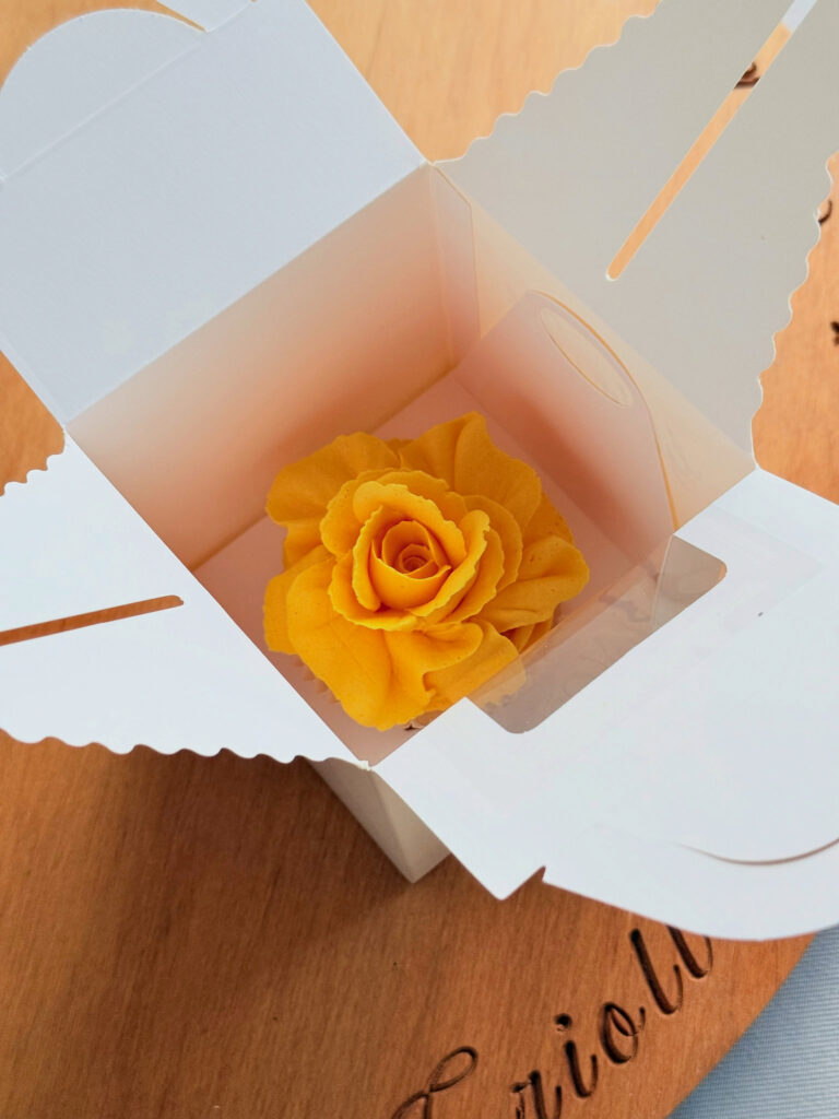 Single Yellow Rose Cupcake Gift Angled View by Criollo Designer Cakes in Dunedin, Otago
