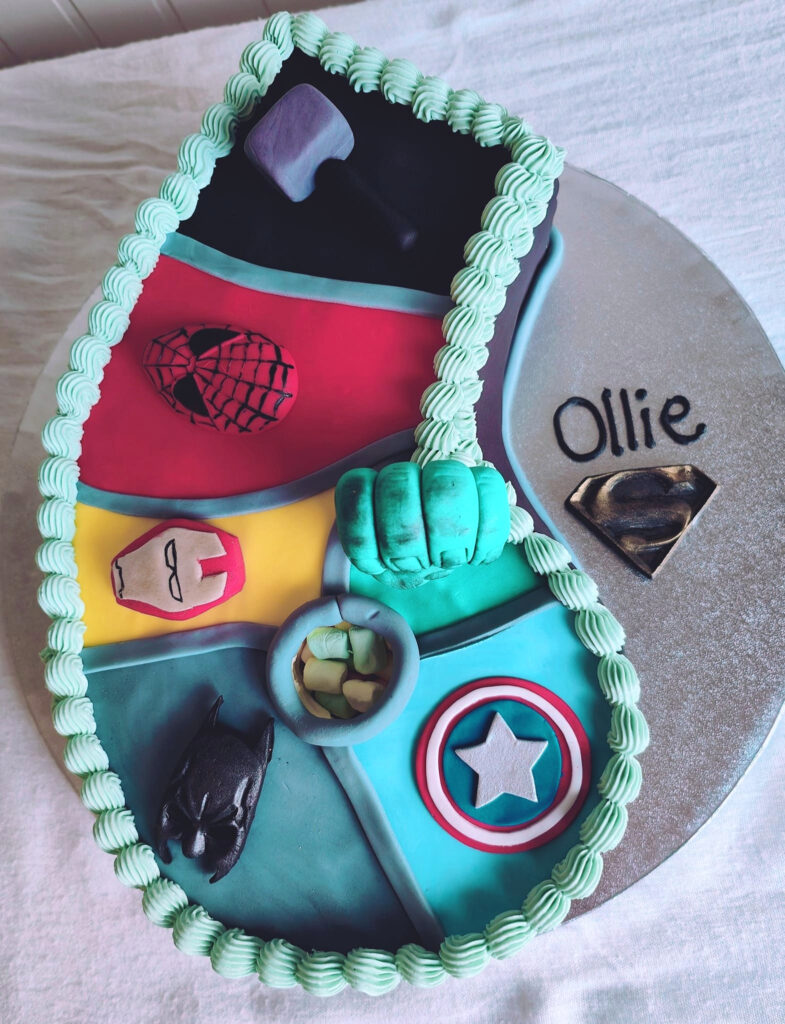 Superhero Number Six Shaped Birthday Cake