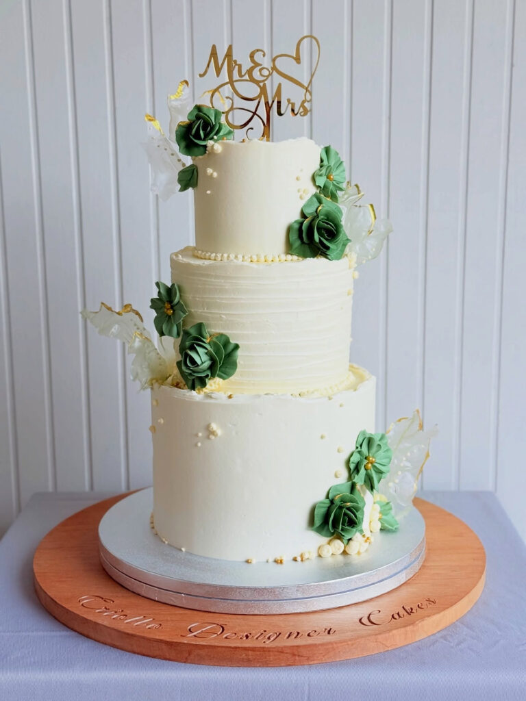 White and Green Floral Cascade Three-Tier Wedding Cake by Criollo Designer Cakes in Dunedin, Otago